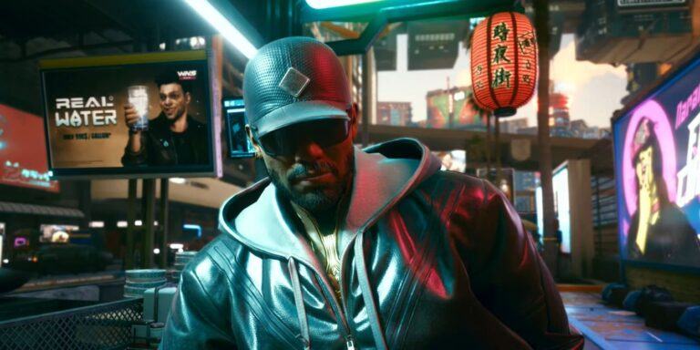 Cyberpunk 2077 Kerry Eurodyne talking to the player, disguised in sunglasses, a big jacket, and a baseball cap.