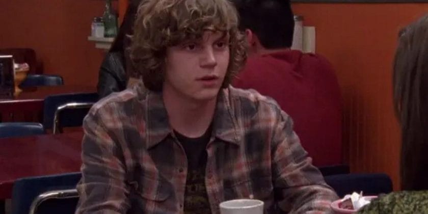 Evan Peters as Jack Daniels, sitting in a restaurant on One Tree Hill
