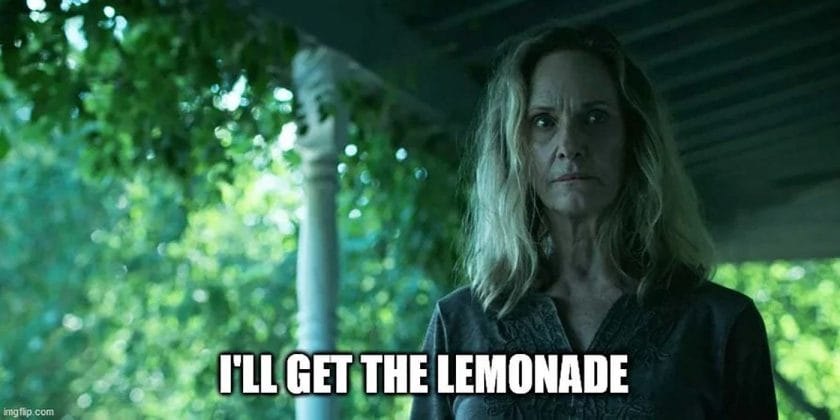 Meme from Ozark, Darlene standing on the porch looking bored.