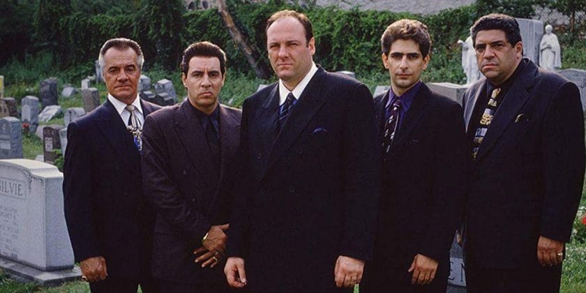 sopranos main actor standing in a cemetery