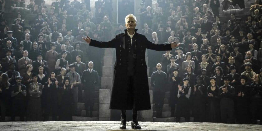 Johnny Depp plays Grindelwald with open arms in front of the crowd.