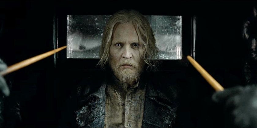 Grindelwald is locked in a carriage, wand pointed at him, where are the wonderful beasts