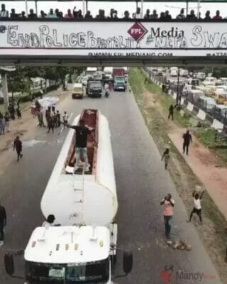 #EndSARS: Davido Protests On Top Of A Fuel Tanker (Photo, Video)