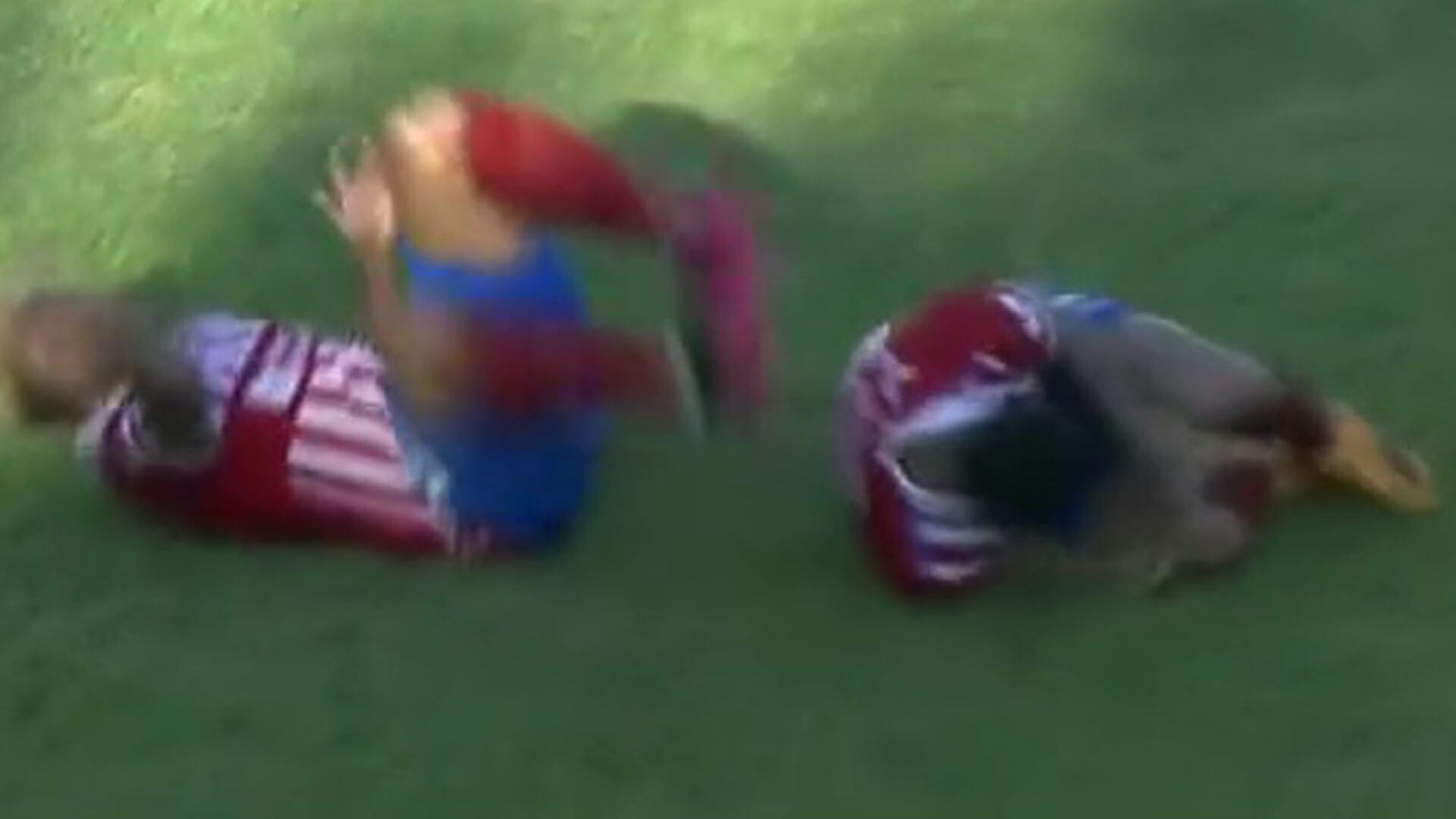 Watch footballer’s shocking lunge leave TWO opponents rolling in agony as fans demand double 'life sentence’