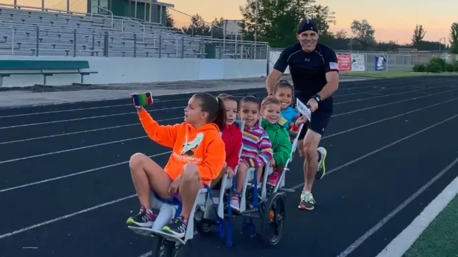 US man achieves fastest 1 km stroller push with five kids. Watch