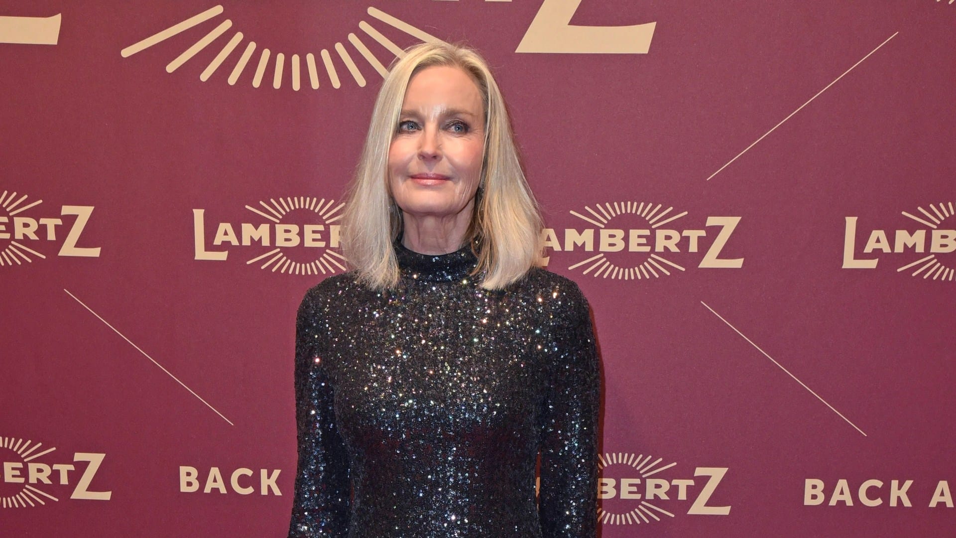 Legendary eighties sex symbol hasn't aged a day as she walks the red carpet 45 years after movie debut