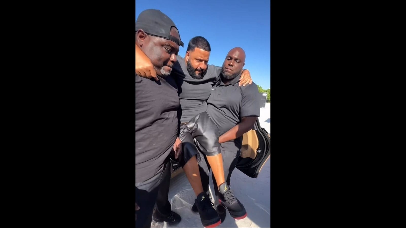 DJ Khaled makes security guards carry him to keep sneakers clean, faces backlash. Watch