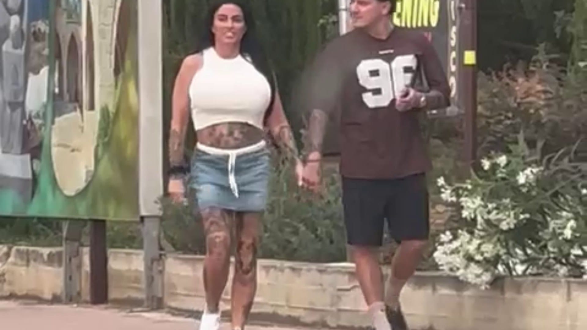 Bankrupt Katie Price looks carefree as she strolls hand in hand with boyfriend JJ Slater in Ayia Napa after court dodge