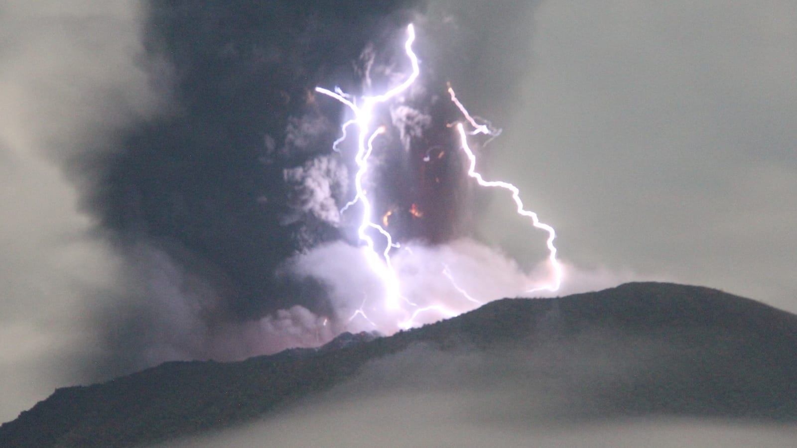 Ash soars 4 km into sky as Indonesian volcano erupts with dramatic purple lightning