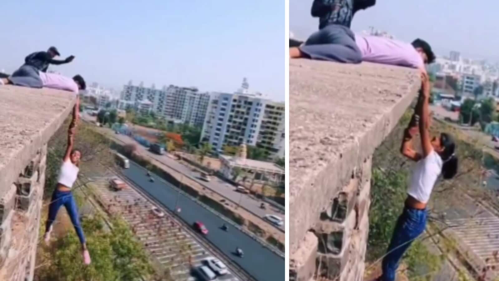 Pune girl hangs from top of building in dangerous stunt. Viral video sparks outrage: ‘Heights of stupidity’